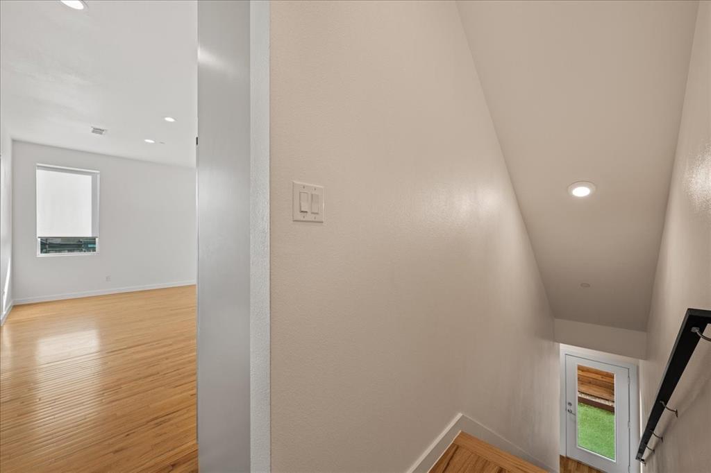 1715 Bennett Avenue, Unit 104 Dallas, TX 75206 - Photo 8 of 35 a view of an empty room