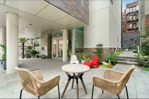 a view of a porch with potted plants