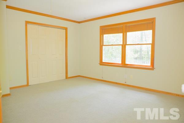 1213 Terry Road Durham, NC 27712 - Photo 14 of 22 an empty room with a window