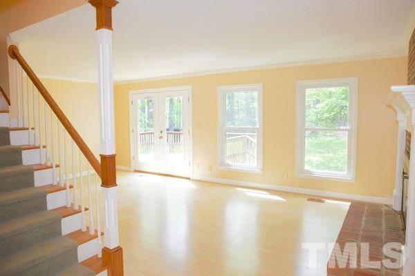 1213 Terry Road Durham, NC 27712 - Photo 8 of 22 a view of an entryway with wooden floor