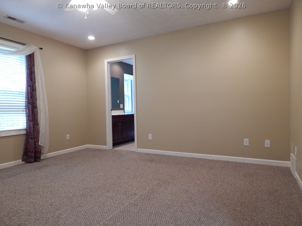 349 Bluelick Road Winfield, WV 25213 - Photo 13 of 28 LARGE MASTER WITH PRIVATE BATH AND LG WALK IN CLOSET.