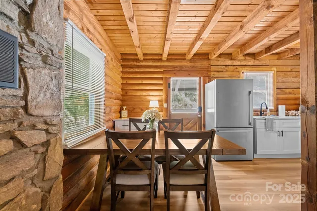 a view of a kitchen with furniture and window