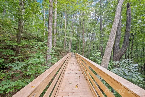 a view of balcony and yard