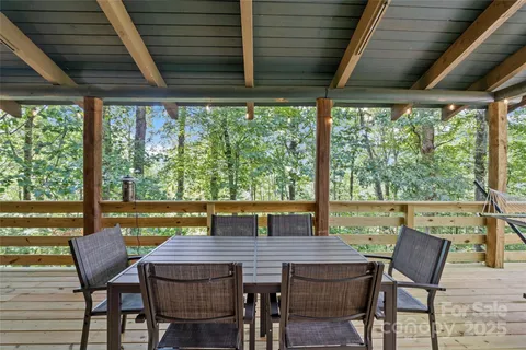 a view of a patio with a table chairs and a table