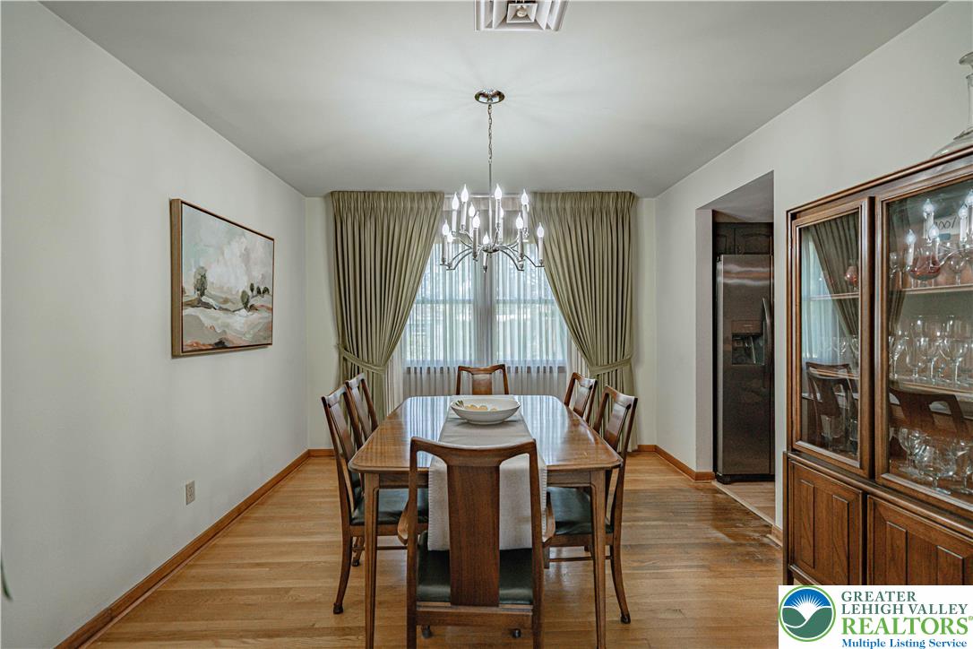 3045 Rambeau Road Bethlehem, PA 18020 - Photo 11 of 52 a dining room with furniture window wooden floor