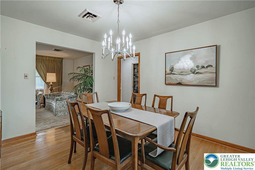 3045 Rambeau Road Bethlehem, PA 18020 - Photo 14 of 52 a view of a dining room with furniture and chandelier
