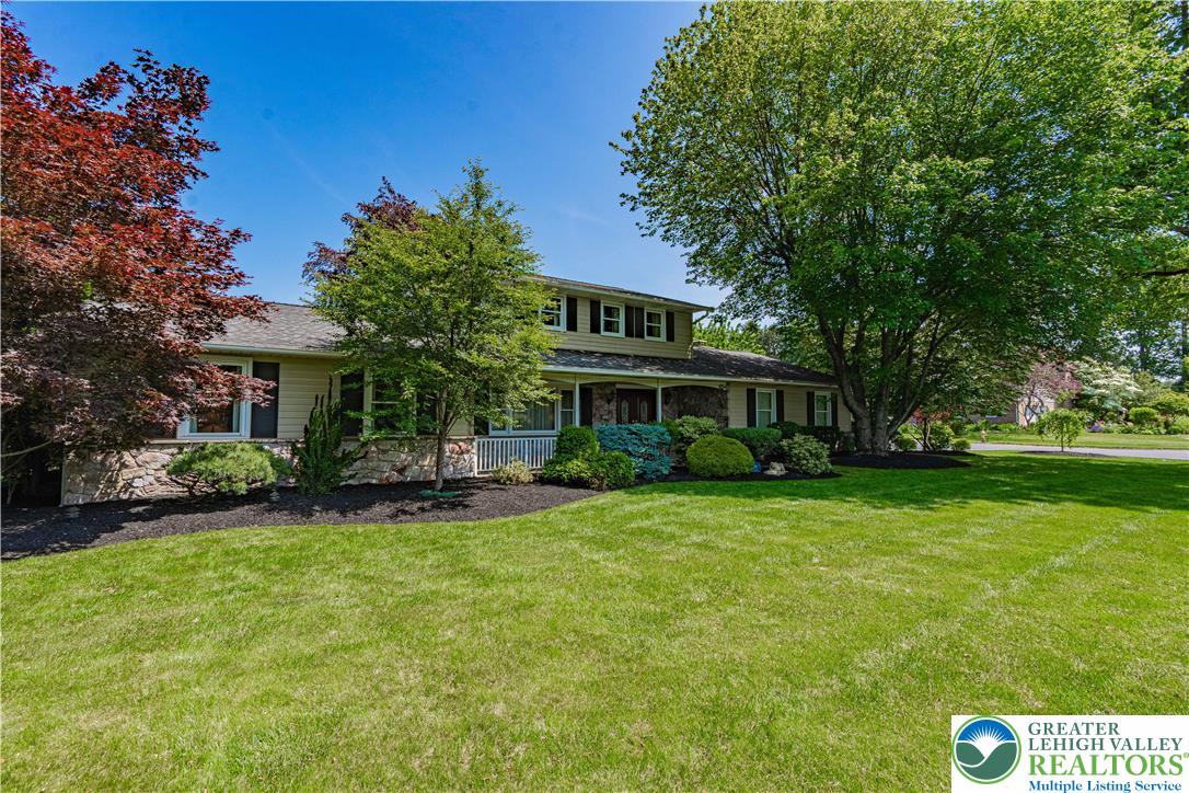 3045 Rambeau Road Bethlehem, PA 18020 - Photo 2 of 52 a front view of a house with a garden
