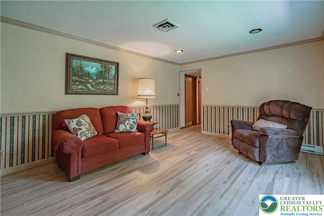 3045 Rambeau Road Bethlehem, PA 18020 - Photo 30 of 52 a living room with furniture and a wooden floor
