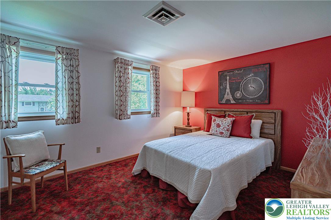 3045 Rambeau Road Bethlehem, PA 18020 - Photo 36 of 52 a bedroom with a bed and a table in it