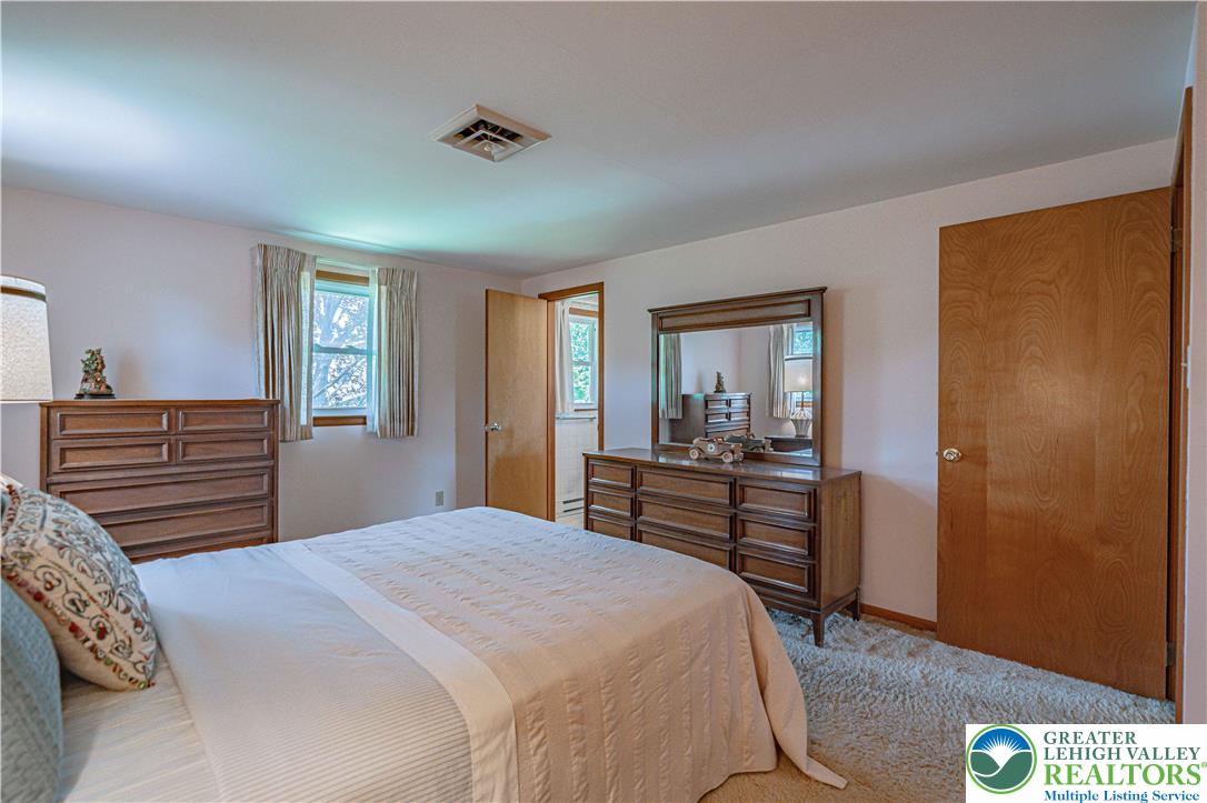 3045 Rambeau Road Bethlehem, PA 18020 - Photo 39 of 52 a bedroom with a bed and a dresser