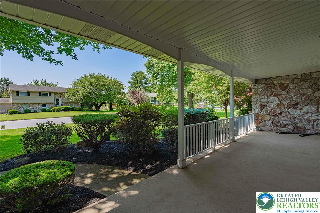 3045 Rambeau Road Bethlehem, PA 18020 - Photo 4 of 52 a view of a porch with furniture and garden