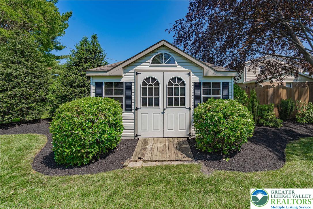 3045 Rambeau Road Bethlehem, PA 18020 - Photo 46 of 52 a front view of a house with a garden