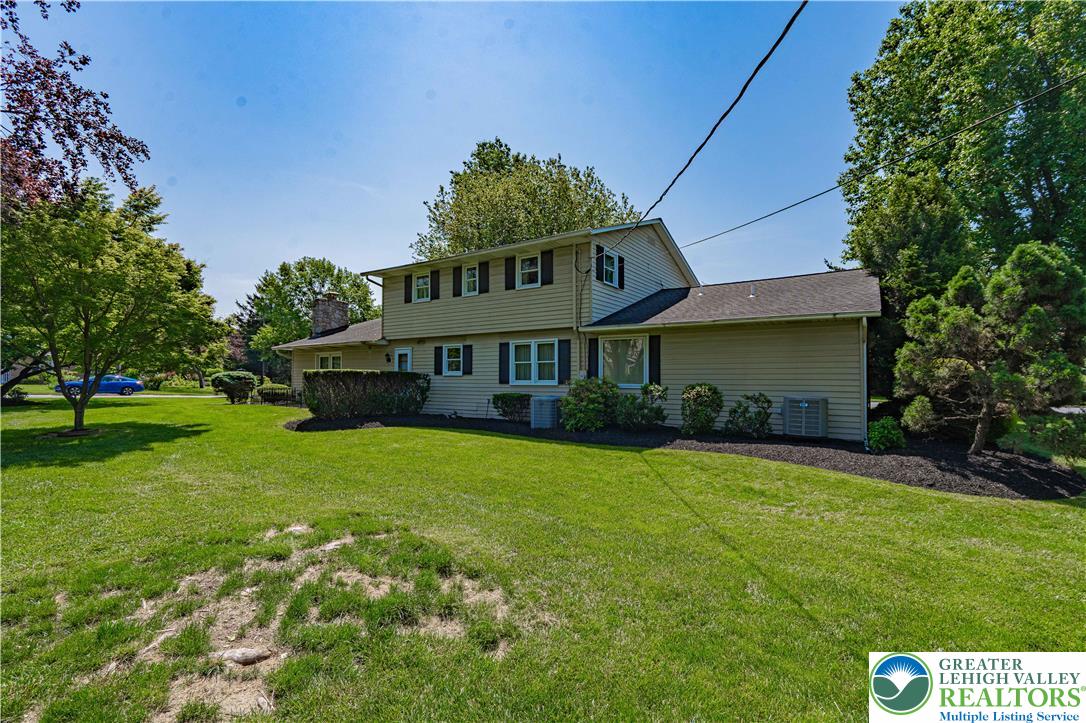 3045 Rambeau Road Bethlehem, PA 18020 - Photo 49 of 52 a front view of a house with garden