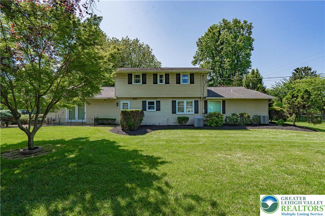 3045 Rambeau Road Bethlehem, PA 18020 - Photo 50 of 52 a front view of a house with a garden