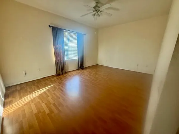 a view of an empty room and window