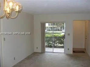 a view of a room with a large window