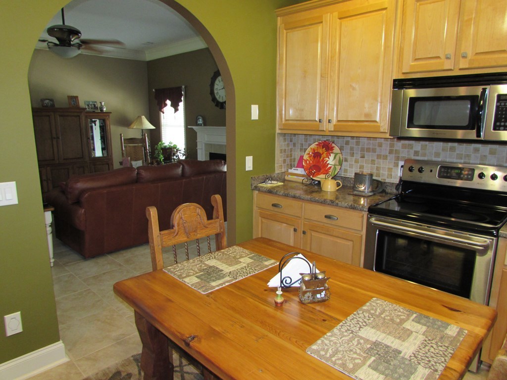 7440 Goodall Mill Road Macon, GA 31216 - Photo 11 of 33 a kitchen with a sink appliances and cabinets