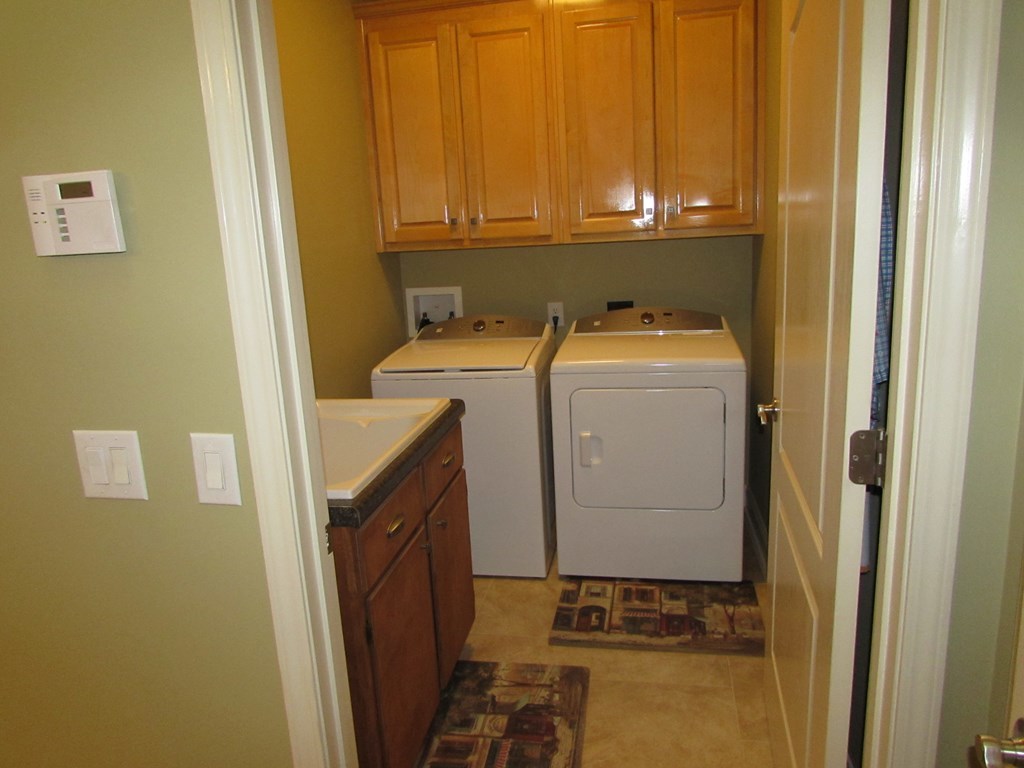 7440 Goodall Mill Road Macon, GA 31216 - Photo 14 of 33 a view of utility room with washer and dryer