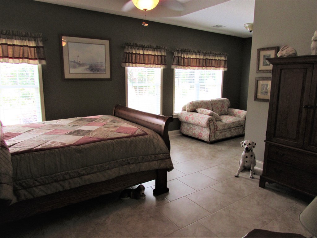 7440 Goodall Mill Road Macon, GA 31216 - Photo 15 of 33 a bedroom with a bed chair and window