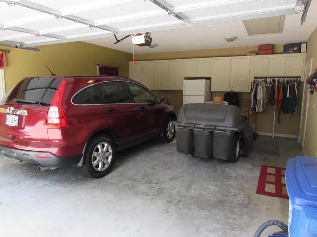 7440 Goodall Mill Road Macon, GA 31216 - Photo 26 of 33 a car parked in a garage