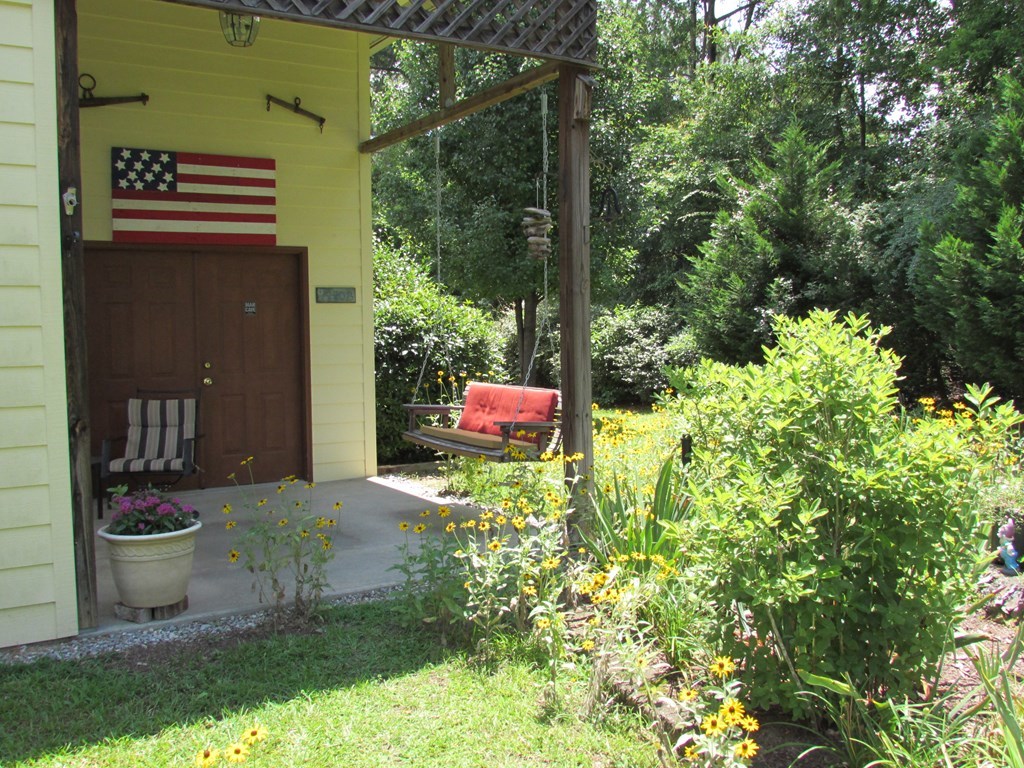 7440 Goodall Mill Road Macon, GA 31216 - Photo 28 of 33 a backyard of a house with lots of green space