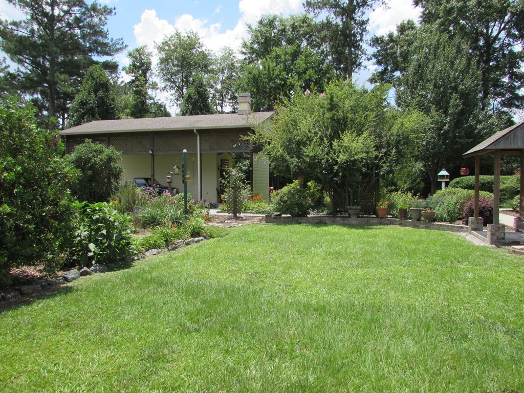 7440 Goodall Mill Road Macon, GA 31216 - Photo 32 of 33 a view of backyard of house with green space