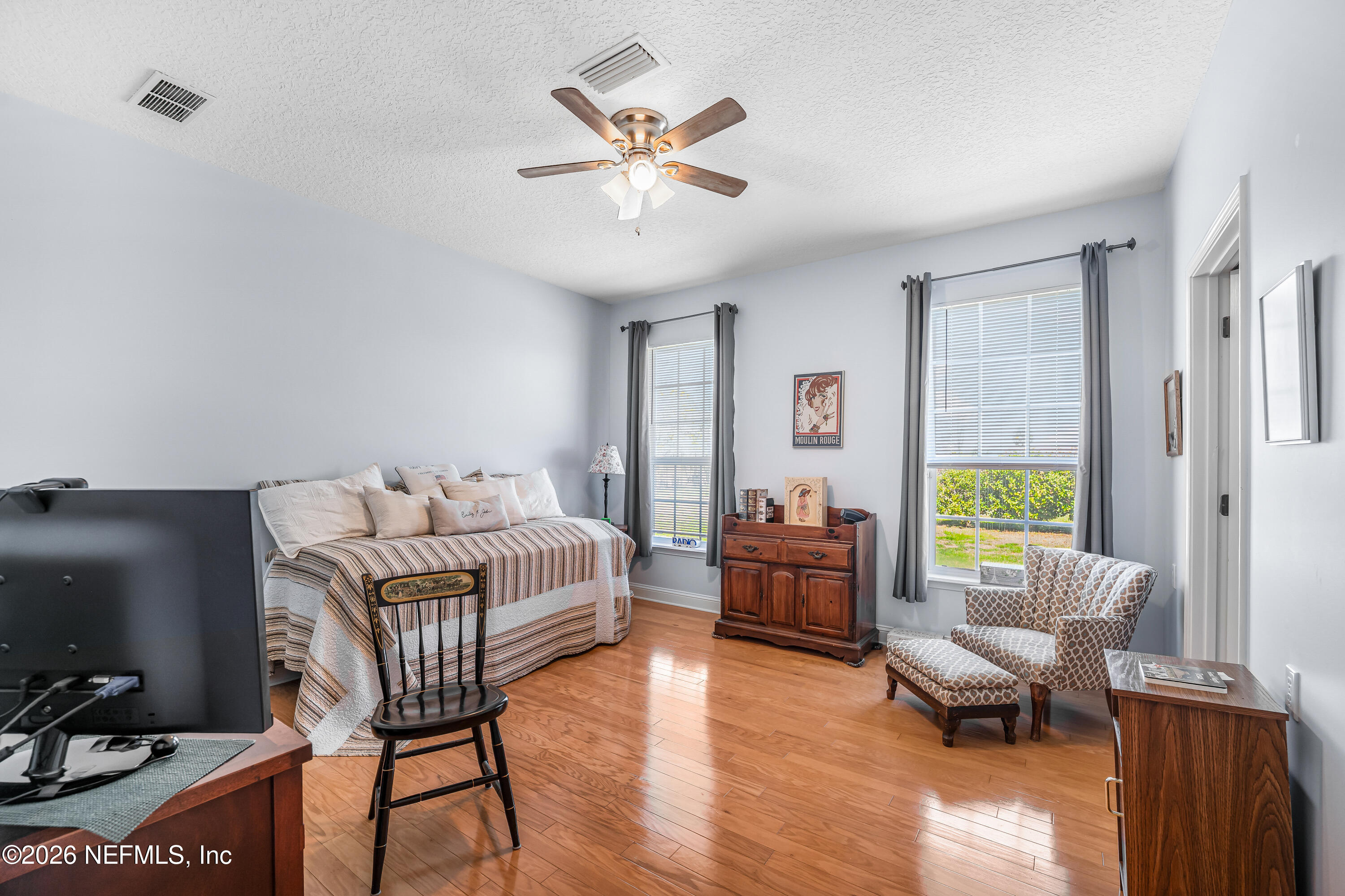 371154 Kings Ferry Road Hilliard, FL 32046 - Photo 23 of 65 a living room with furniture and a window
