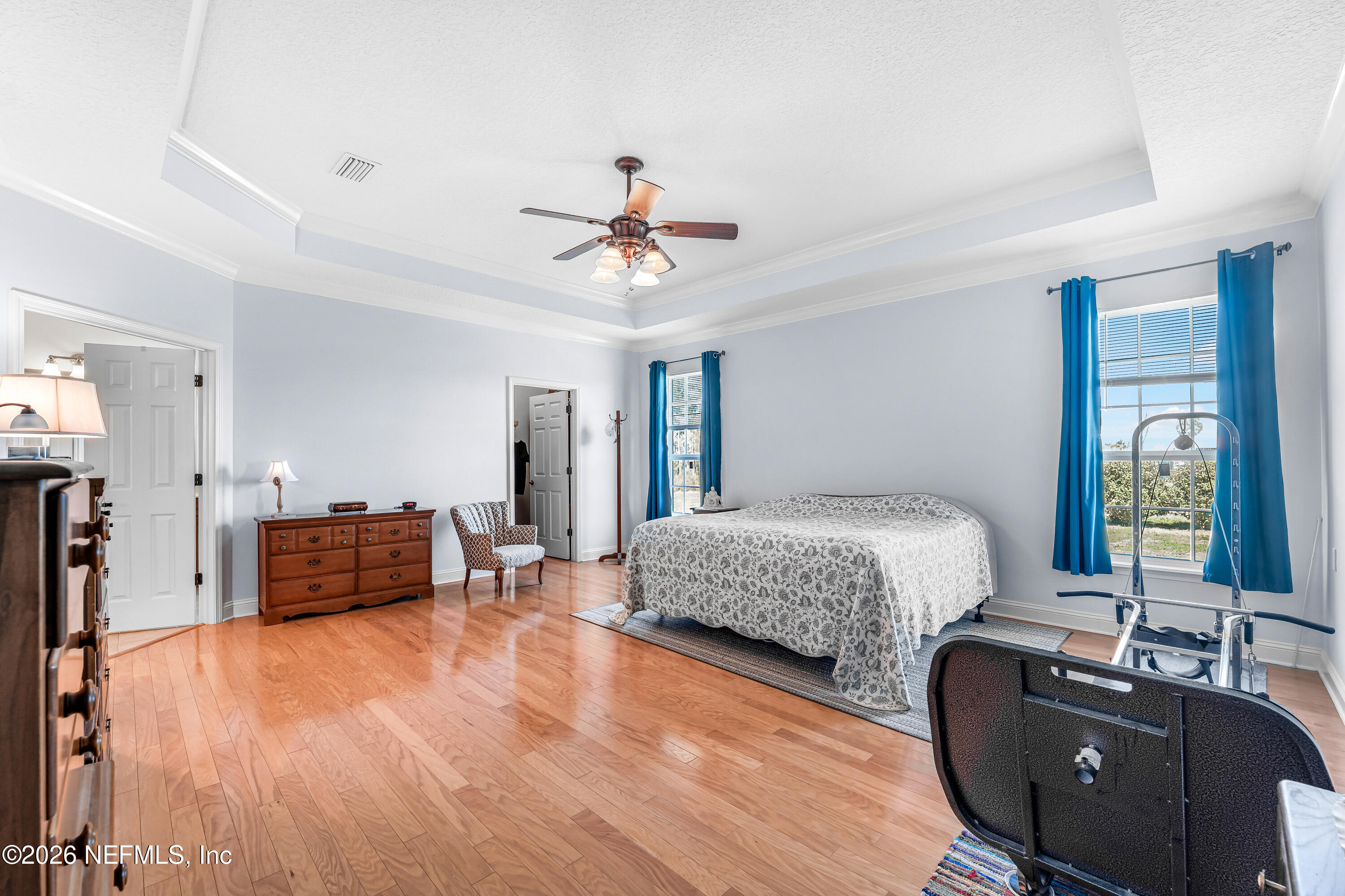 371154 Kings Ferry Road Hilliard, FL 32046 - Photo 26 of 65 a bedroom with furniture and wooden floor