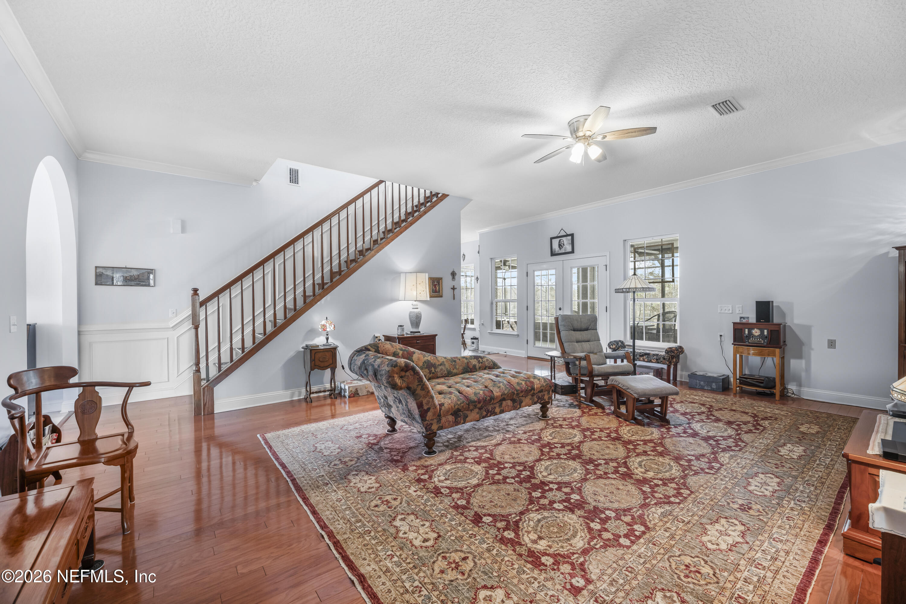 371154 Kings Ferry Road Hilliard, FL 32046 - Photo 4 of 65 a living room with furniture and wooden floor