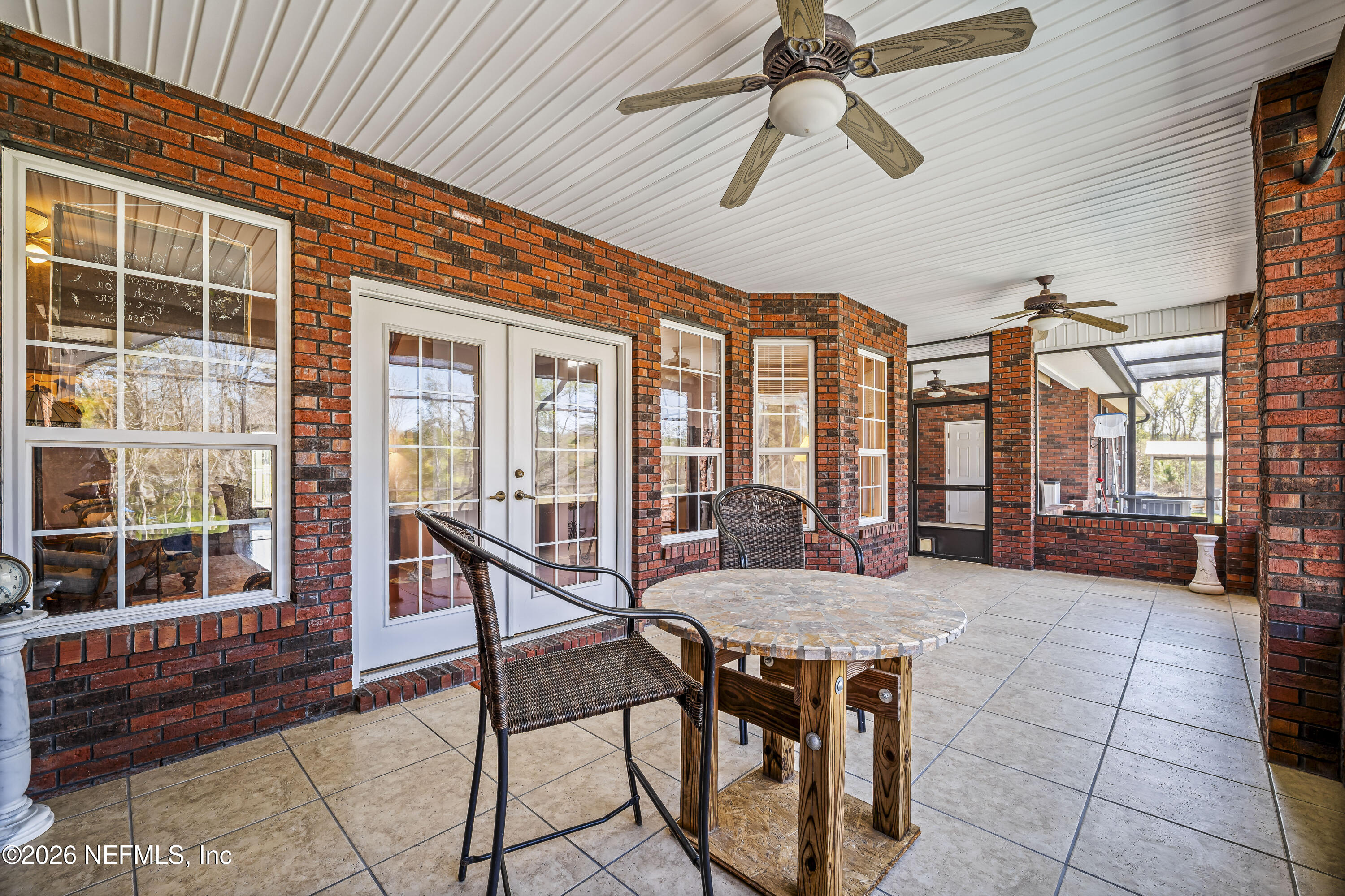 371154 Kings Ferry Road Hilliard, FL 32046 - Photo 43 of 65 a outdoor space with a large window