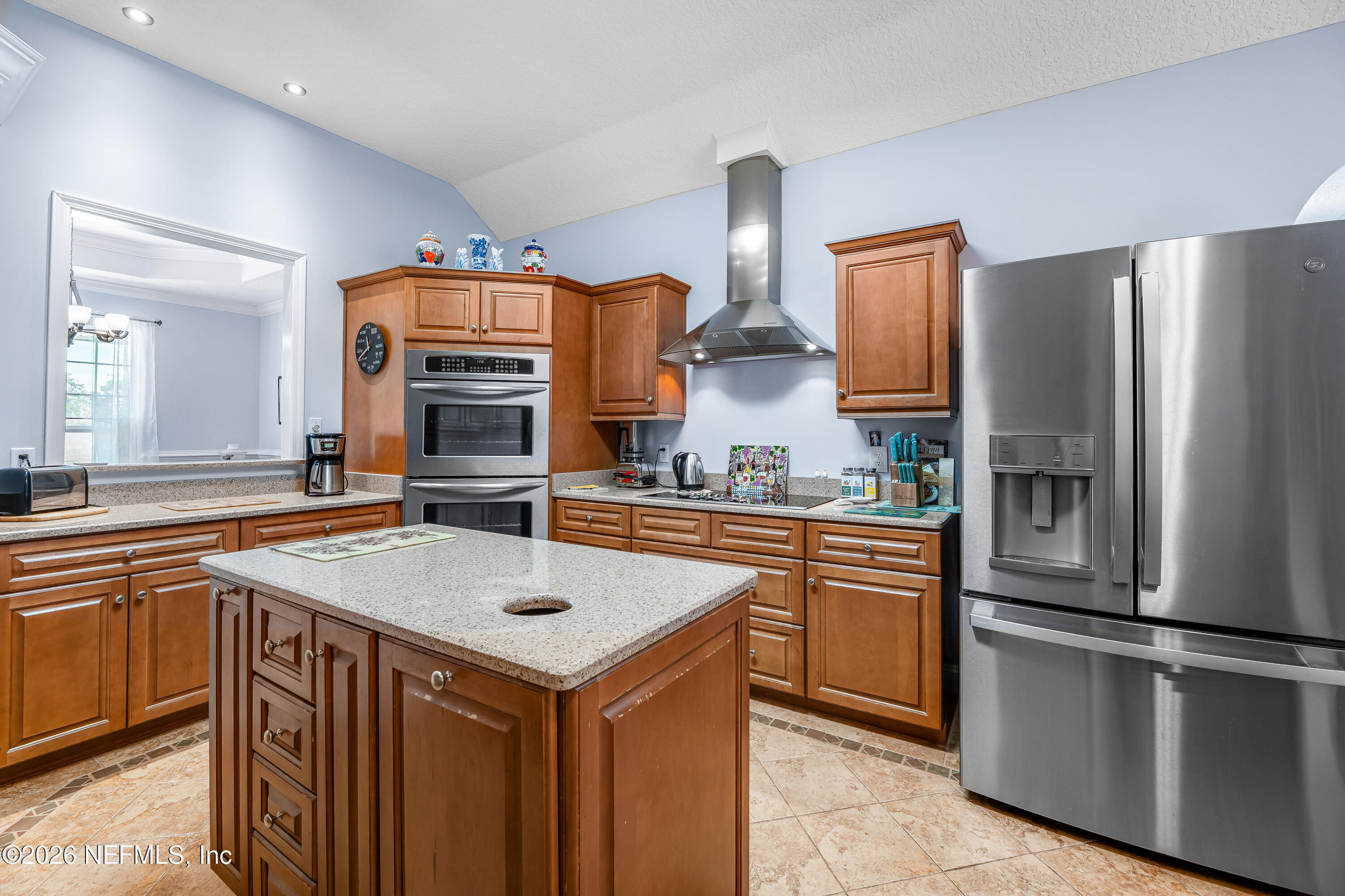 371154 Kings Ferry Road Hilliard, FL 32046 - Photo 5 of 65 a kitchen with stainless steel appliances a sink and a refrigerator
