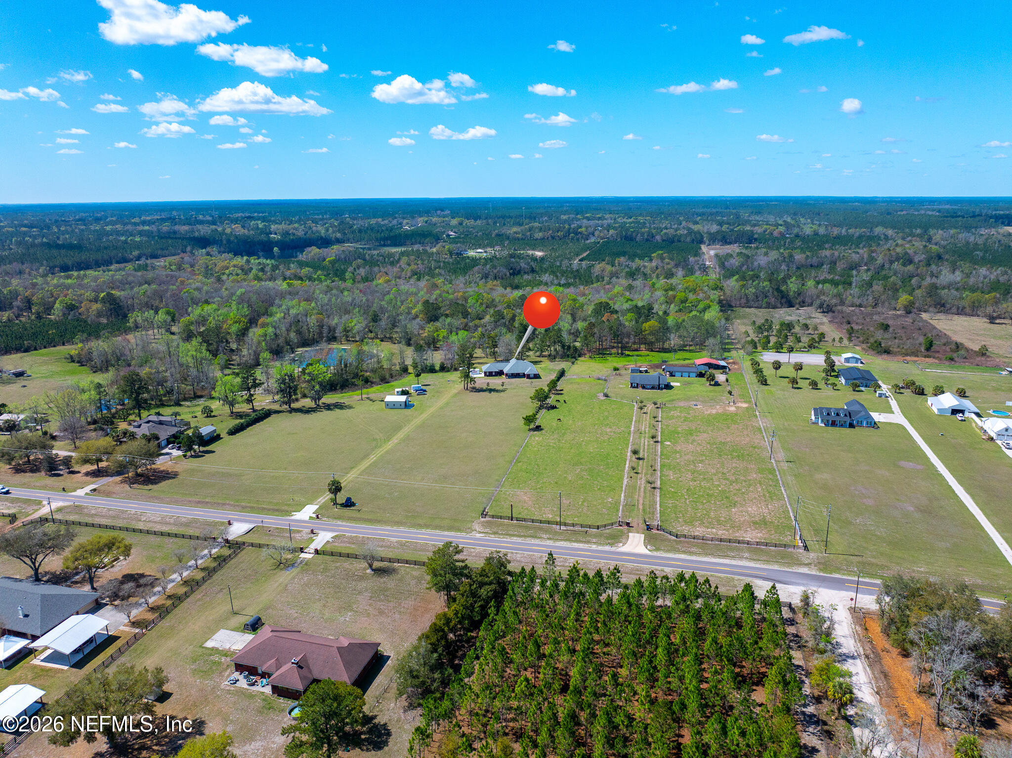 371154 Kings Ferry Road Hilliard, FL 32046 - Photo 61 of 65 an aerial view of a tennis ground