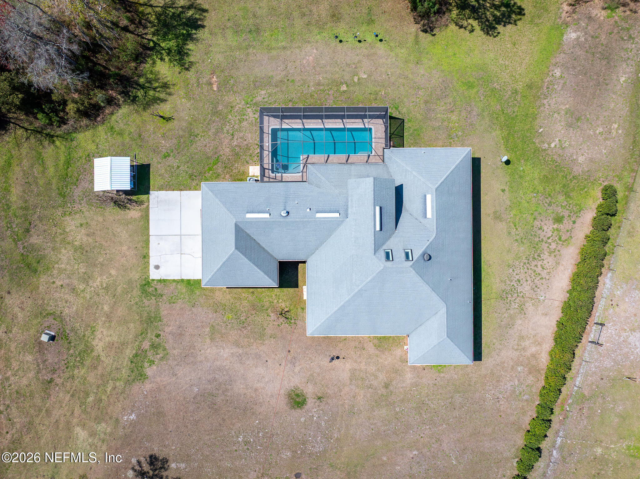 371154 Kings Ferry Road Hilliard, FL 32046 - Photo 9 of 65 an aerial view of a house with a yard