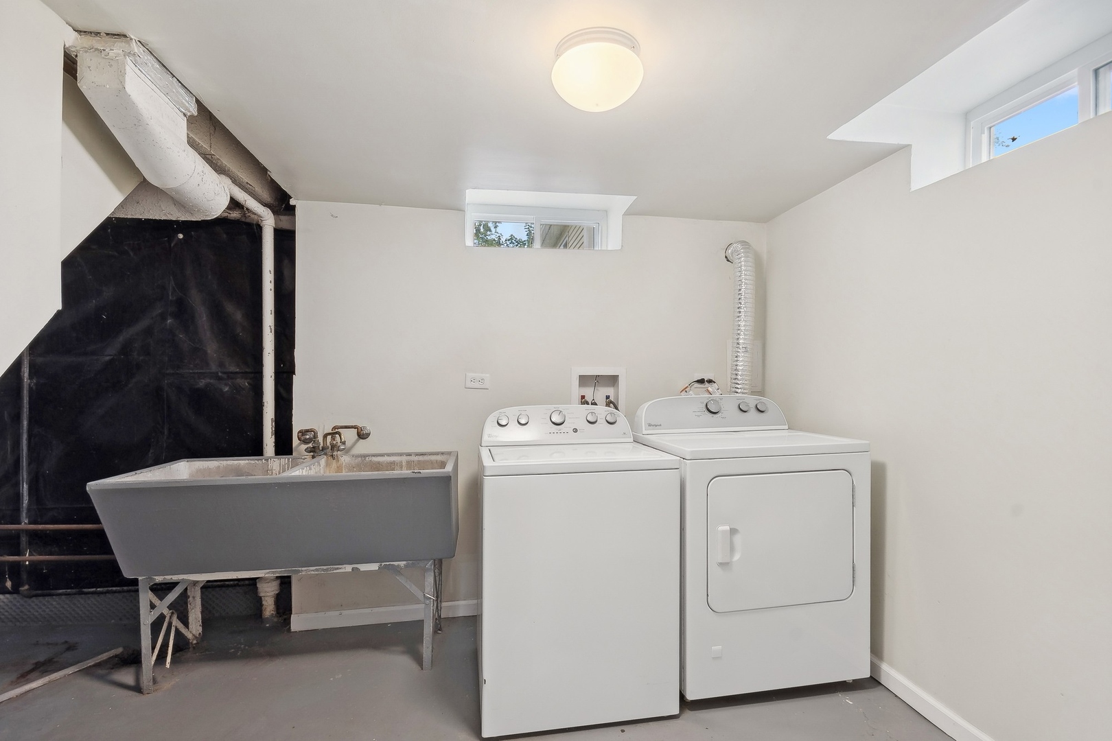 1513 Marquette Road Joliet, IL 60435 - Photo 13 of 16 a view of a room that has a bed and a table in it
