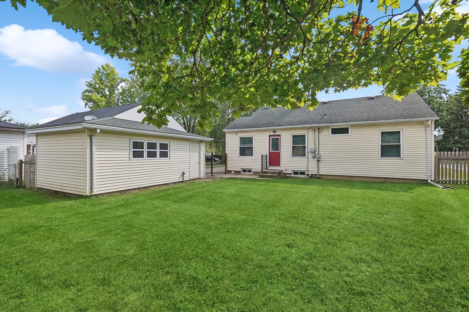 1513 Marquette Road Joliet, IL 60435 - Photo 15 of 16 a view of a house with a backyard