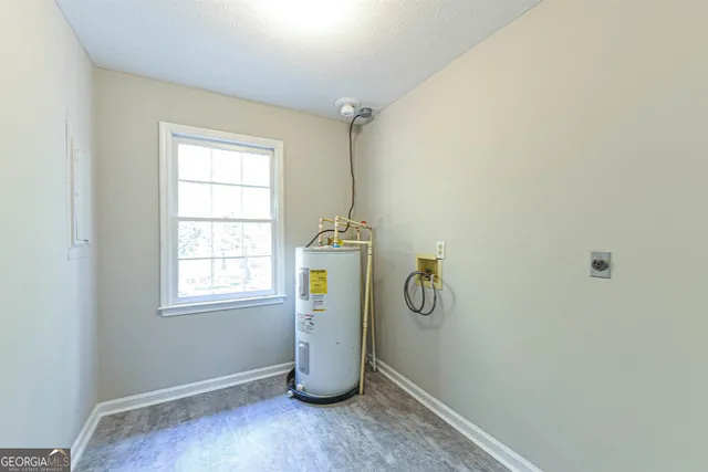 a room with water heater and window