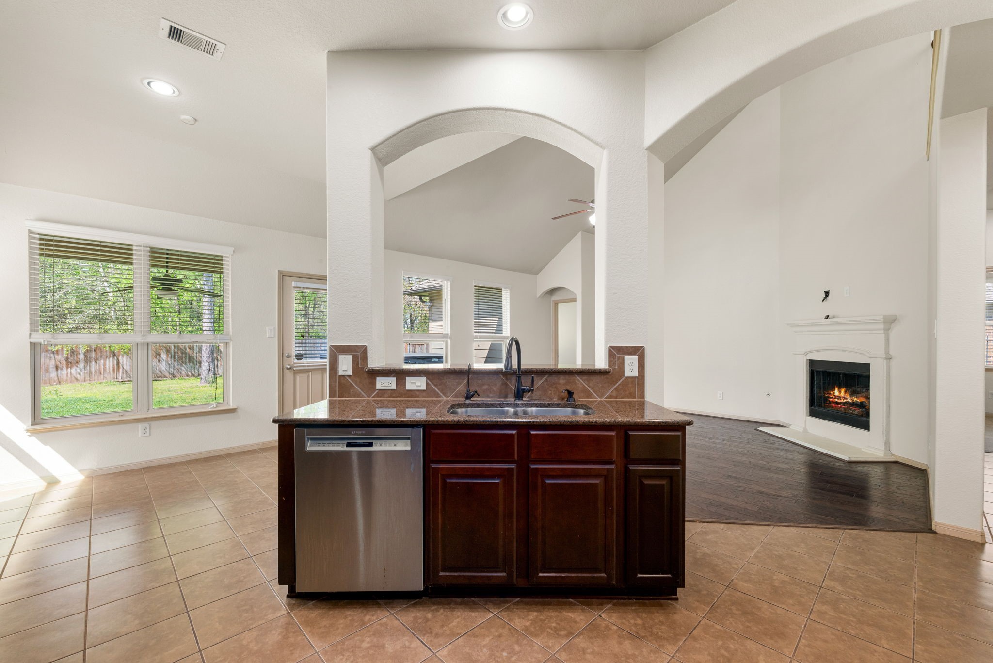 51 Handbridge Place Tomball, TX 77375 - Photo 14 of 46 a spacious bathroom with a granite countertop sink and a large mirror