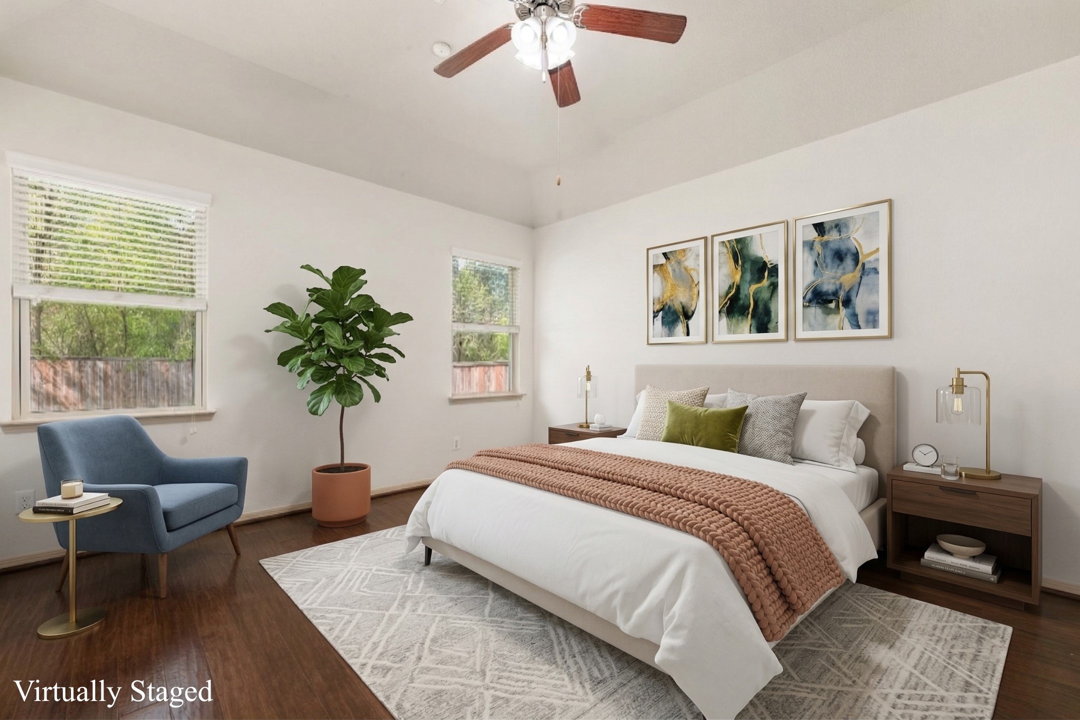 51 Handbridge Place Tomball, TX 77375 - Photo 15 of 46 a bedroom with a large bed and a couch