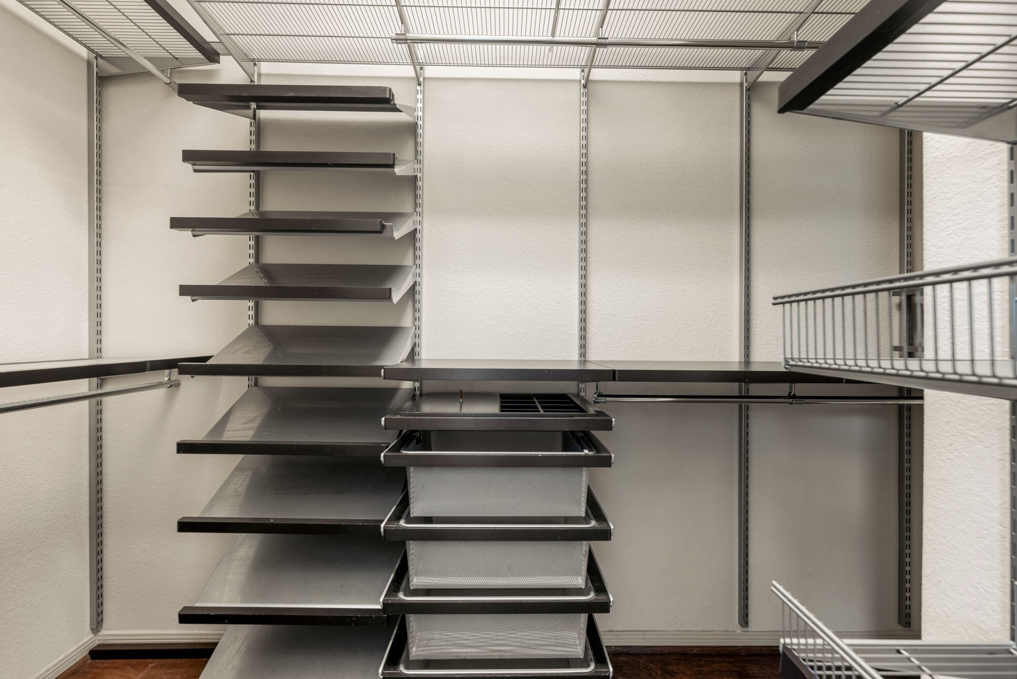 51 Handbridge Place Tomball, TX 77375 - Photo 19 of 46 a view of walk in closet with empty racks