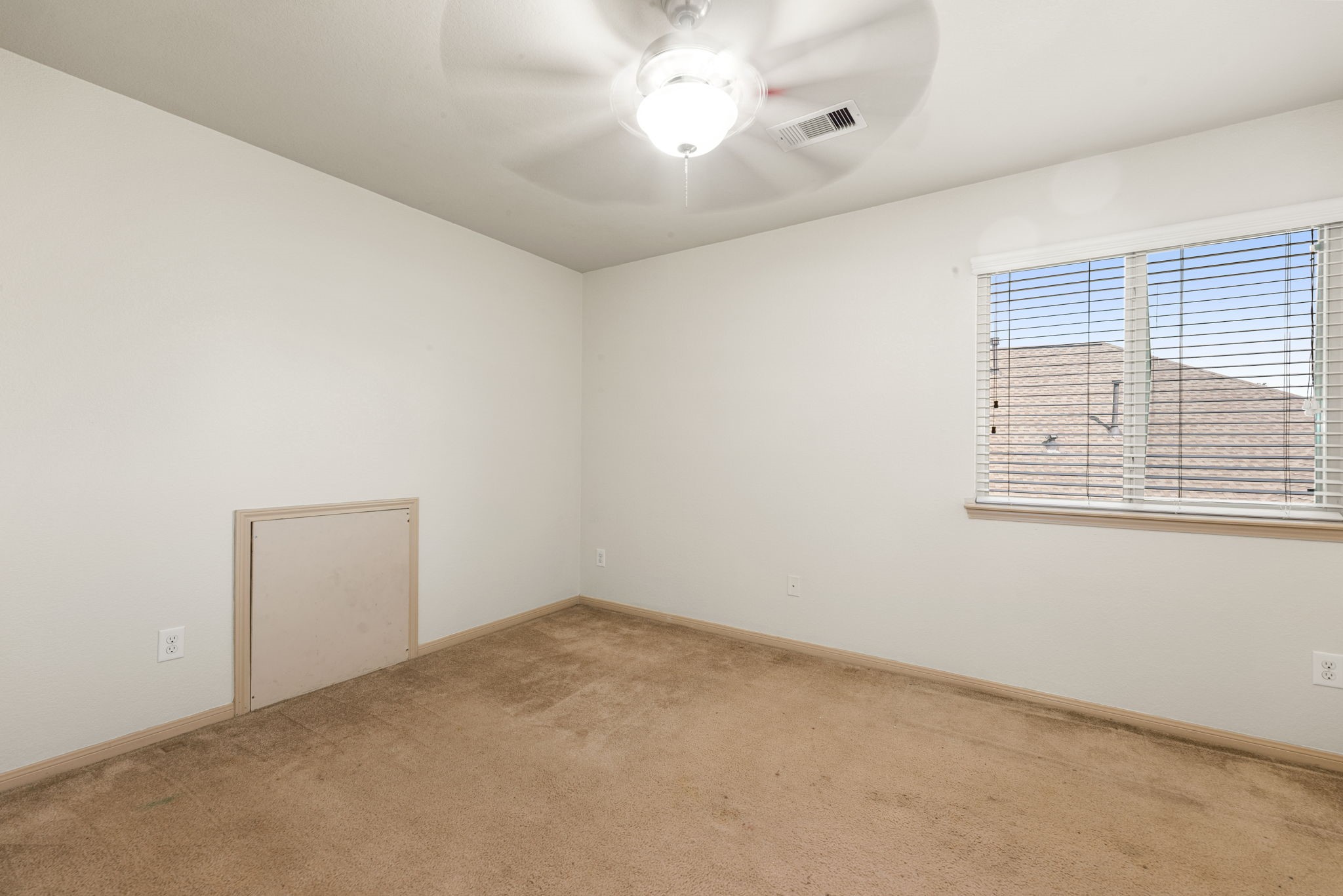 51 Handbridge Place Tomball, TX 77375 - Photo 26 of 46 an empty room with a window