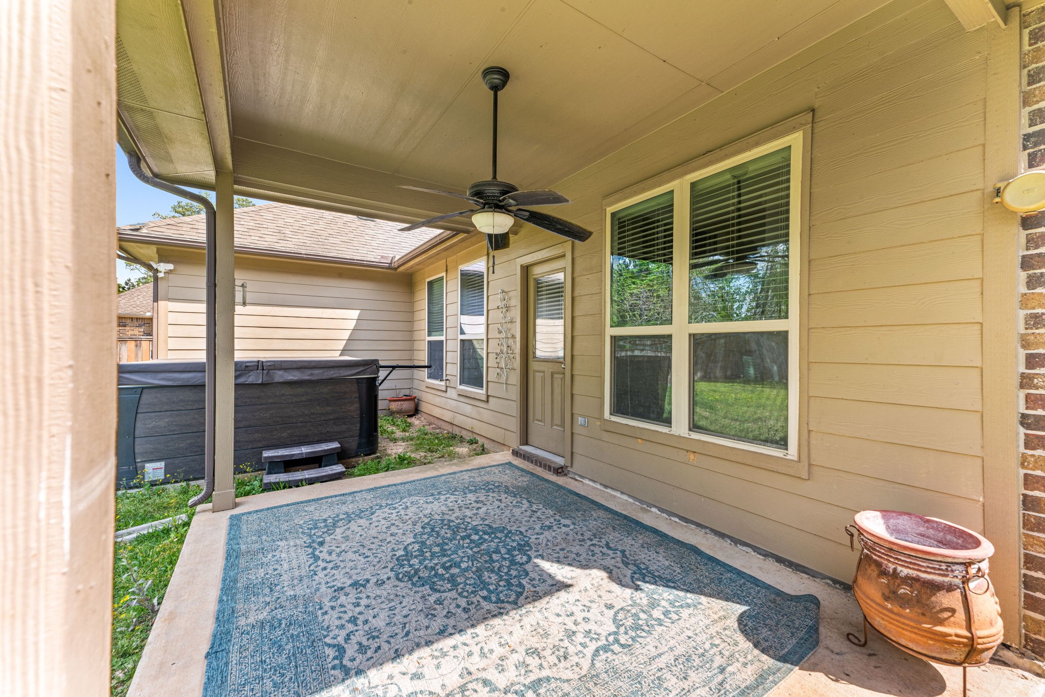 51 Handbridge Place Tomball, TX 77375 - Photo 29 of 46 a front view of a house with a porch
