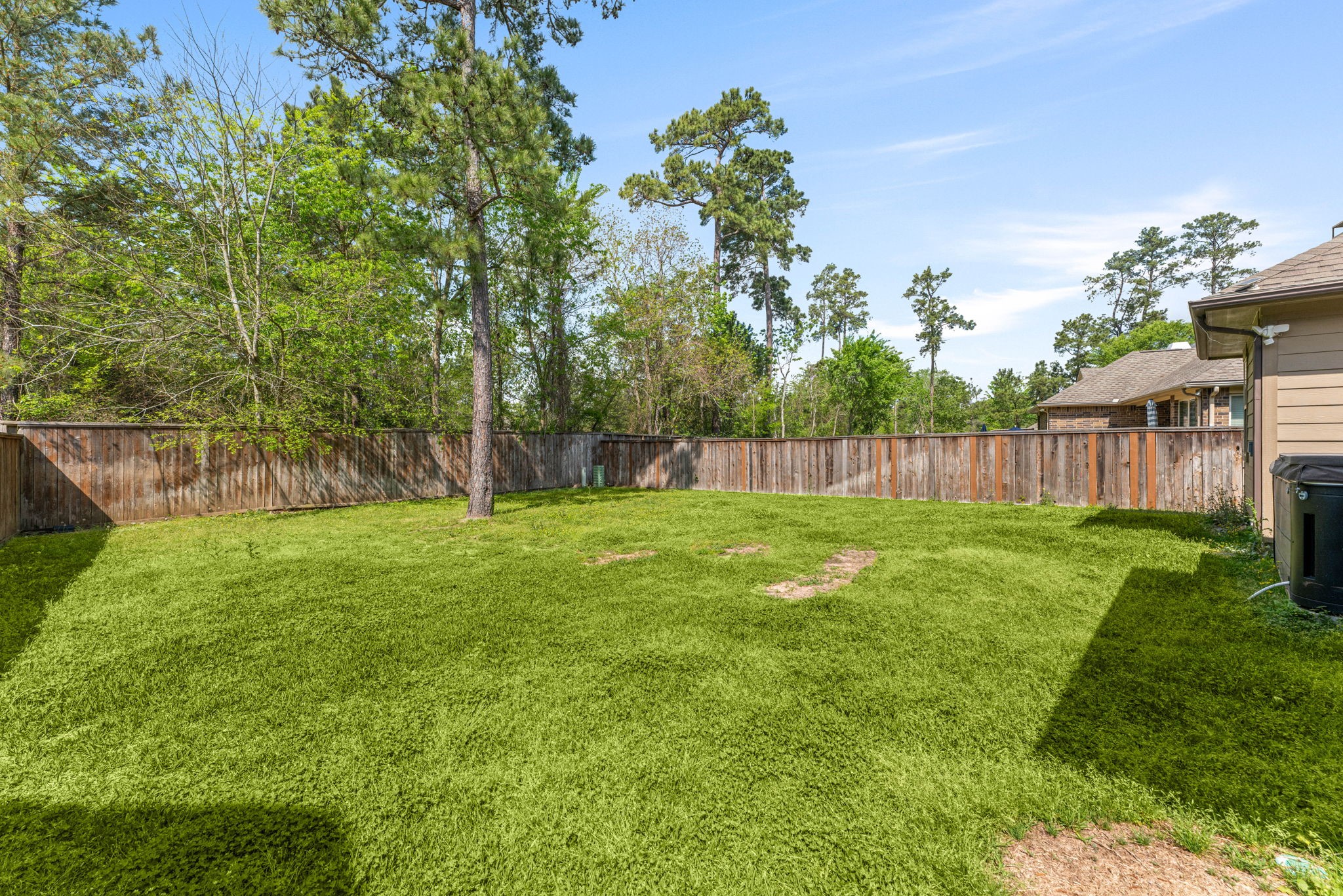 51 Handbridge Place Tomball, TX 77375 - Photo 30 of 46 a view of outdoor space with deck and backyard