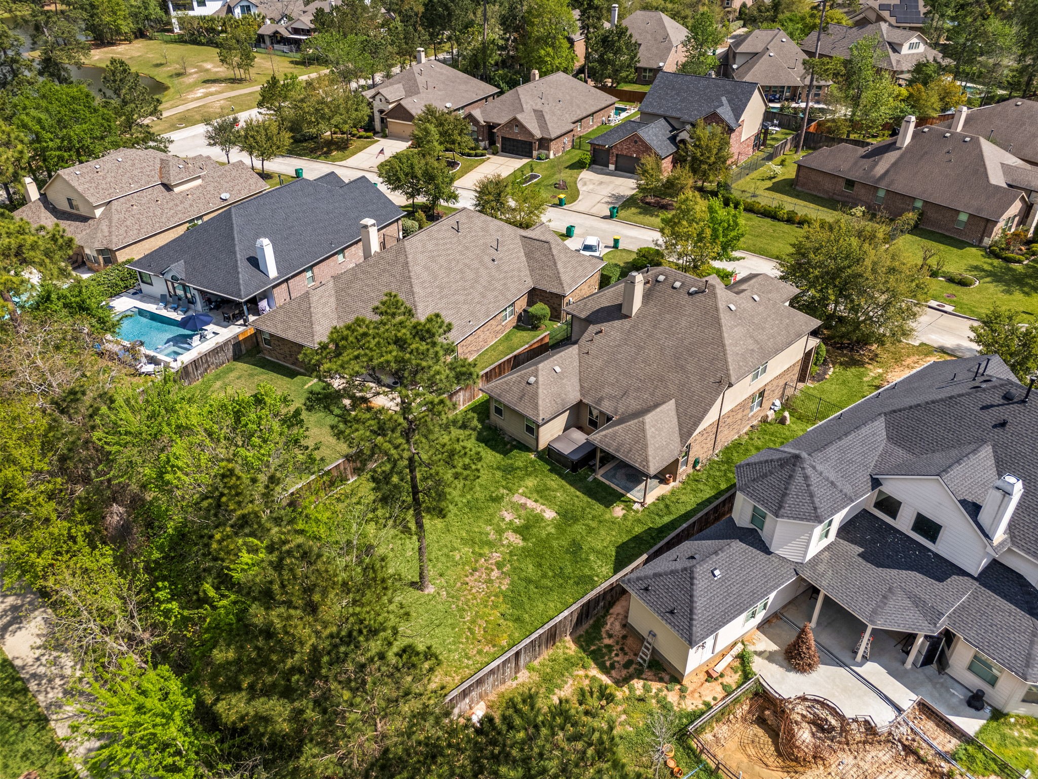 51 Handbridge Place Tomball, TX 77375 - Photo 33 of 46 an aerial view of residential houses with outdoor space