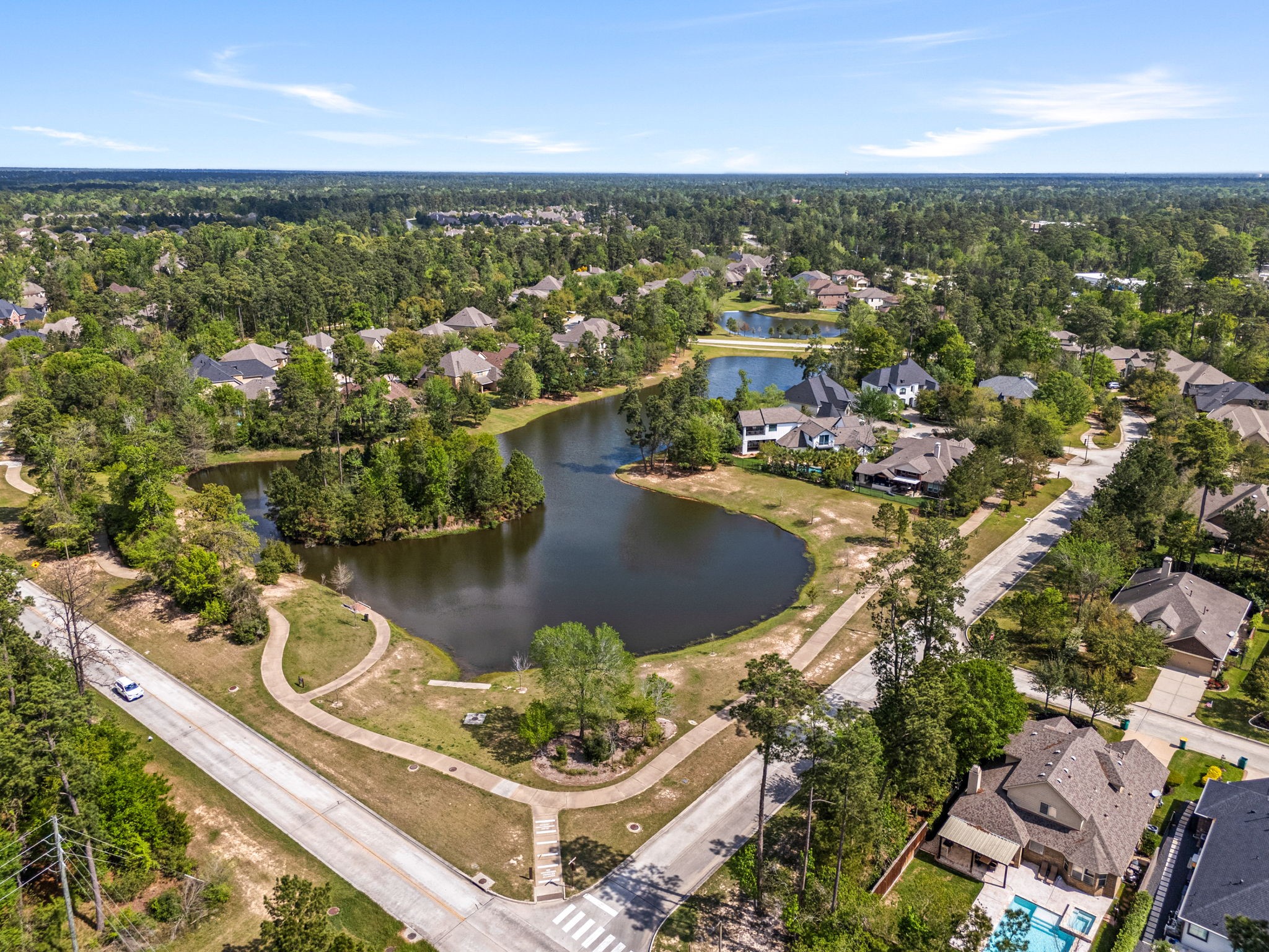 51 Handbridge Place Tomball, TX 77375 - Photo 36 of 46 an aerial view of a residential houses with outdoor space
