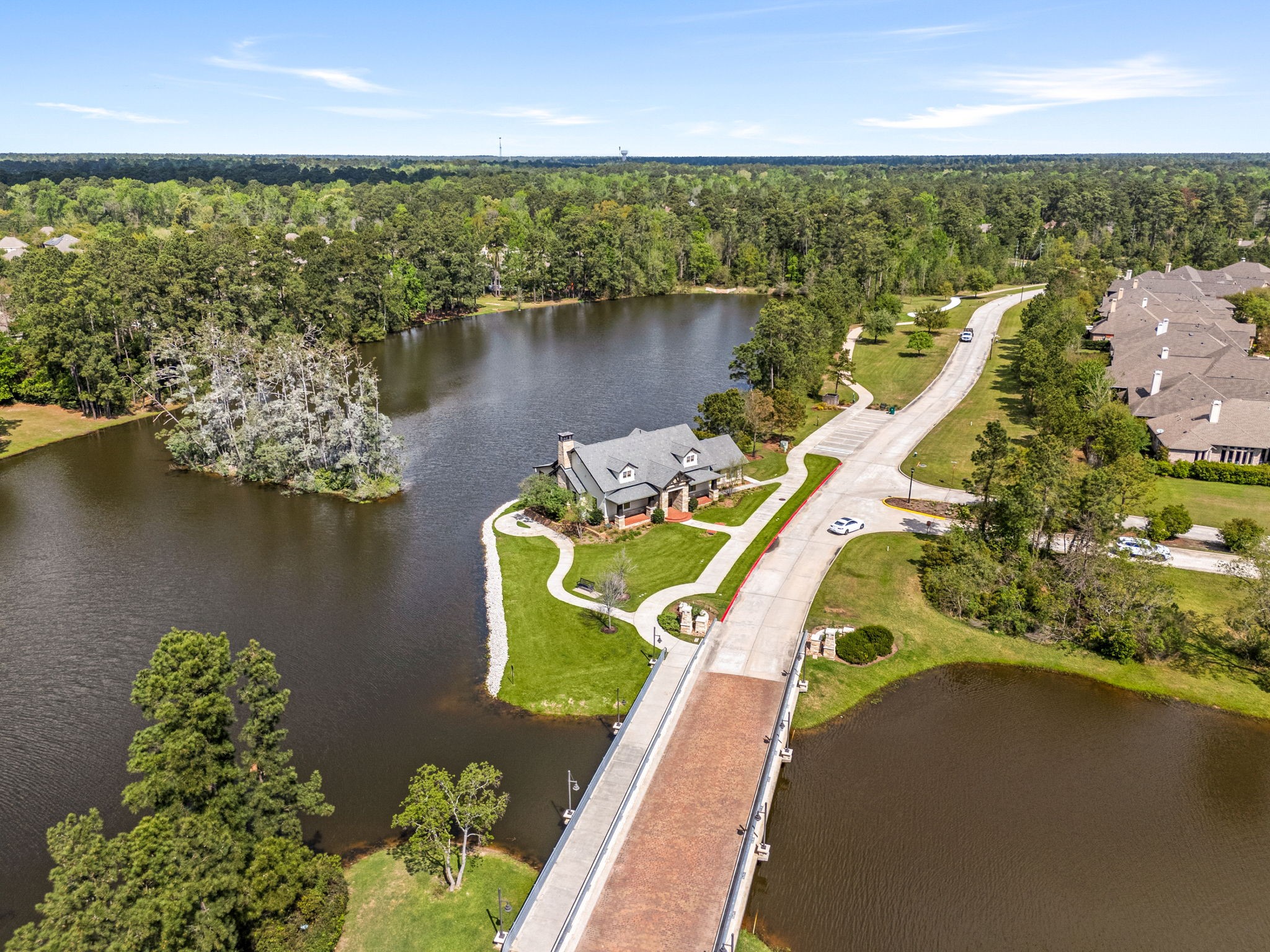 51 Handbridge Place Tomball, TX 77375 - Photo 38 of 46 an aerial view of a house with a ocean view