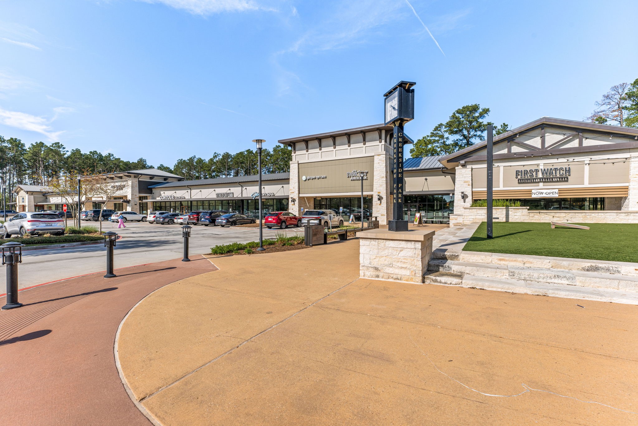 51 Handbridge Place Tomball, TX 77375 - Photo 46 of 46 a swimming pool with outdoor seating and a yard