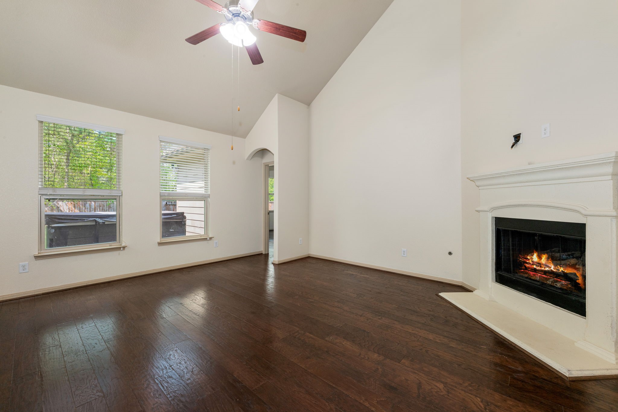 51 Handbridge Place Tomball, TX 77375 - Photo 8 of 46 a view of a room window and wooden floor