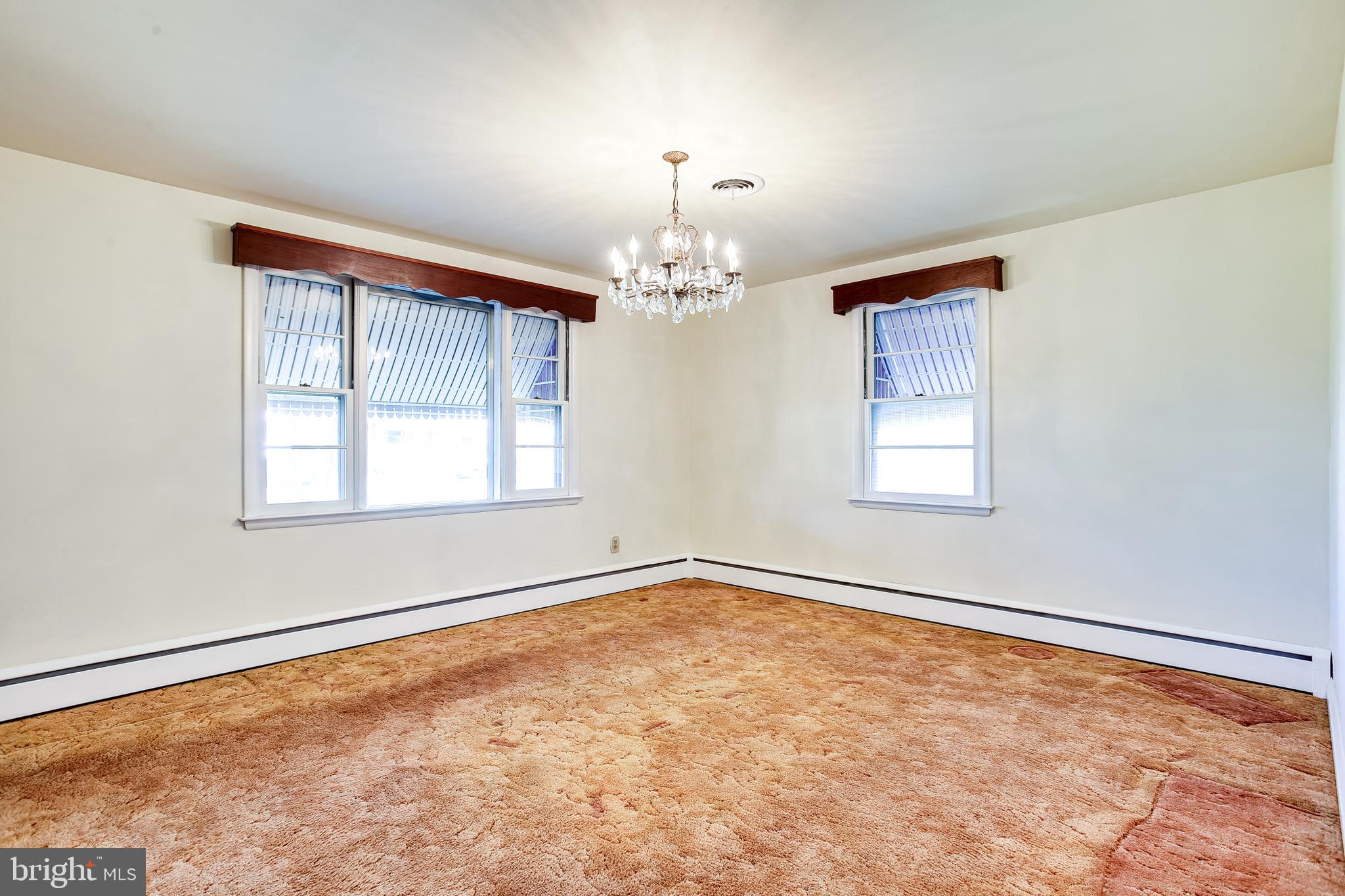 1541 Sulphur Spring Road Baltimore, MD 21227 - Photo 13 of 29 Bedroom 1, hardwood under carpet