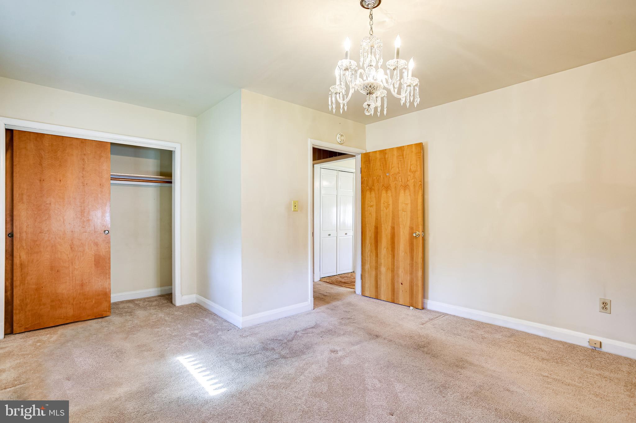 1541 Sulphur Spring Road Baltimore, MD 21227 - Photo 15 of 29 Bedroom 2, hardwood under carpet