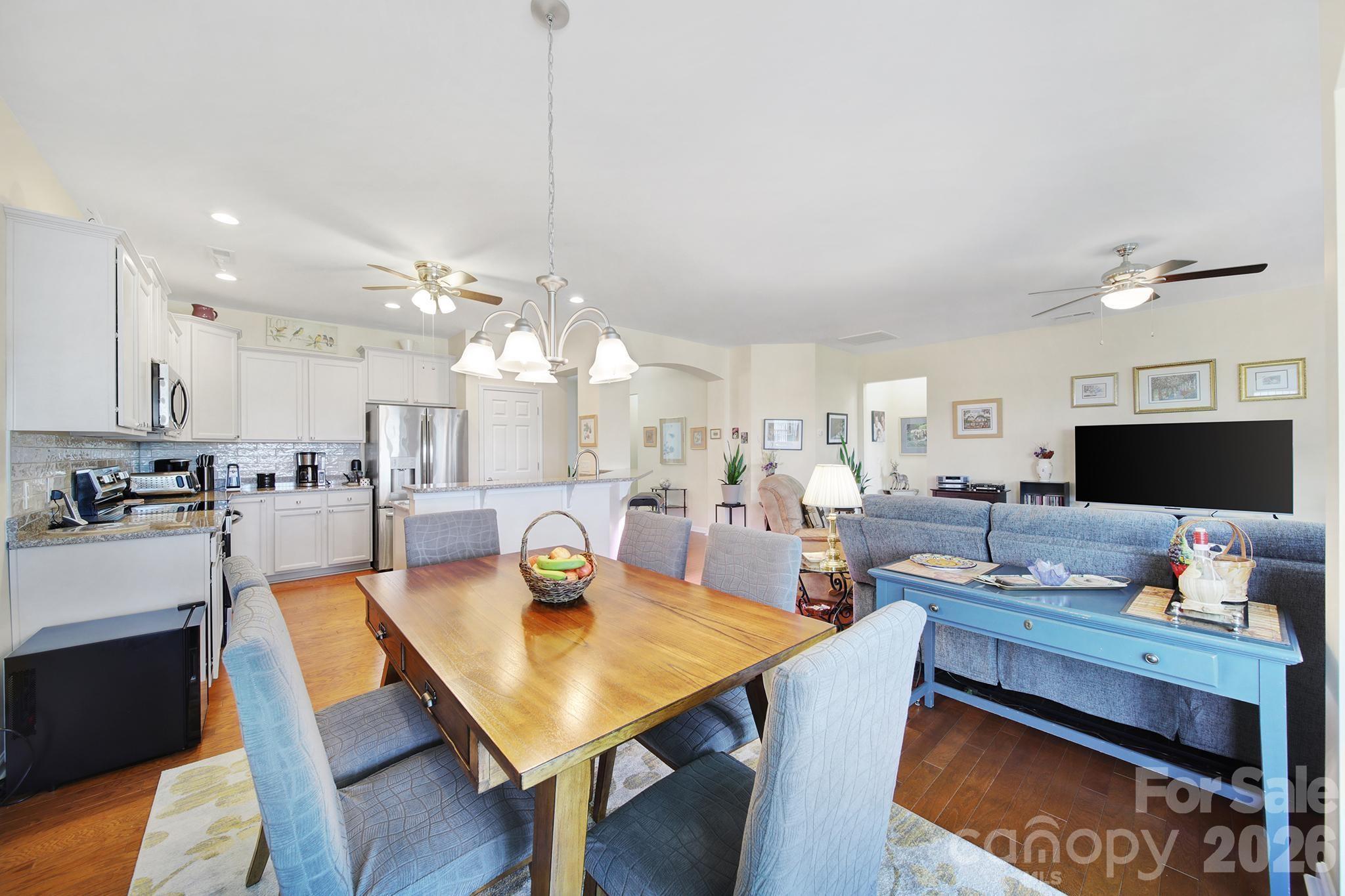 8080 Pawleys Court Fort Mill, SC 29707 - Photo 12 of 44 a view of a dining room with furniture